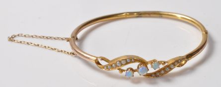 VICTORIAN 9CT GOLD AND OPAL BANGLE BRACELET