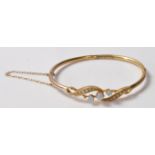 VICTORIAN 9CT GOLD AND OPAL BANGLE BRACELET