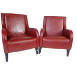 TWO CONTEMPORARY RED FAUX LEATHER ARMCHAIRS