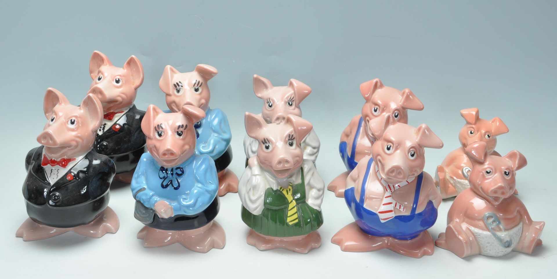 COLLECITON OF TEN VINTAGE LATE 20TH CENTURY CERAMIC NATWEST PIGS