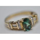9CT GOLD LADIES DRESS RING WITH LARGE FACETED TOURMALINE STONE