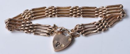 STAMPED 9CT GOLD GATELINK BRACELET