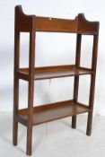 ARTS AND CRAFTS OAK OPEN FRONTED BOOKCASE IN THE MANNER OF LIBERTY'S