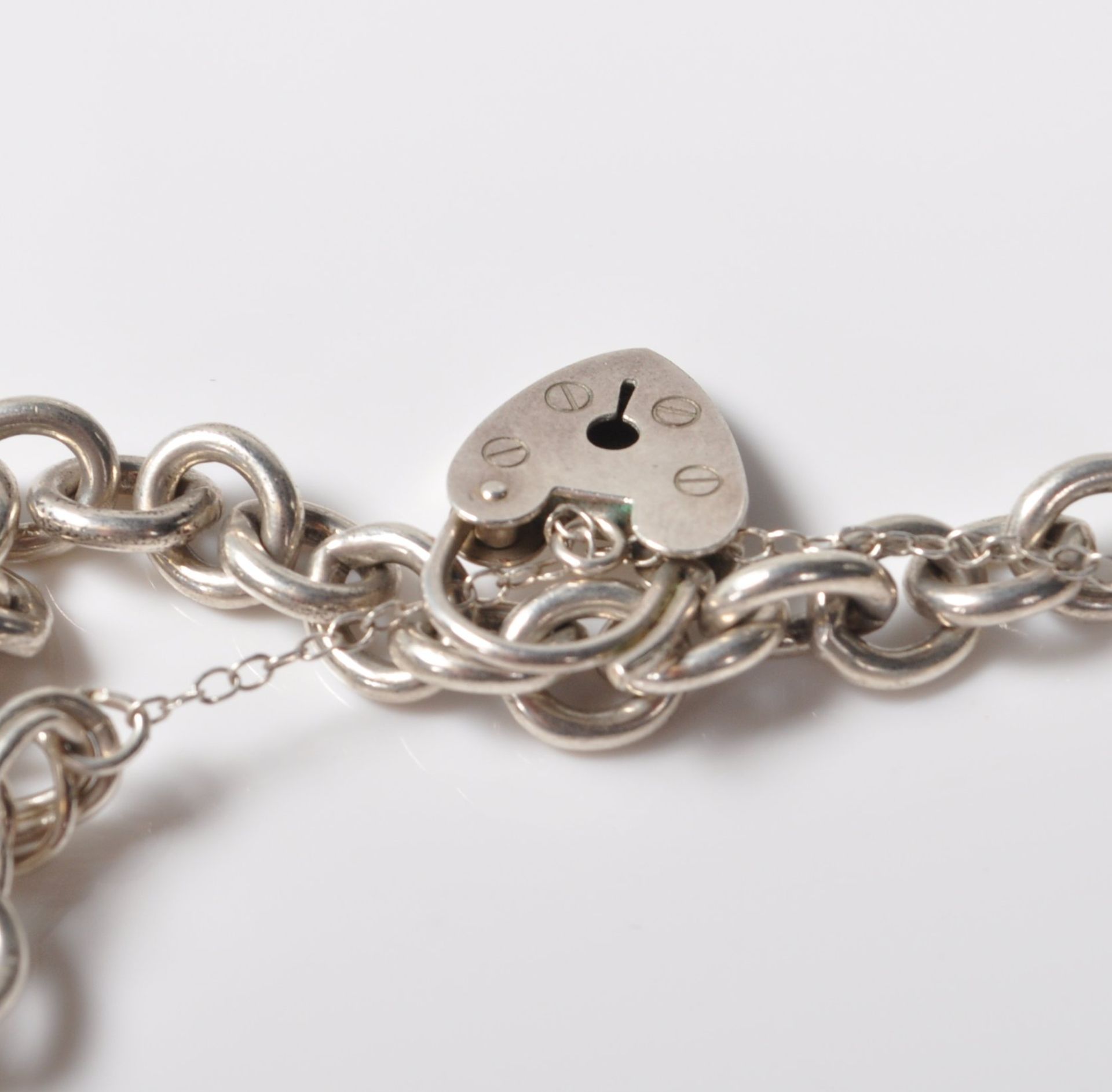 SILVER STAMPED 925 CHARM BRACELET. TOTAL WEIGHT 64 GRAMS. - Image 5 of 8