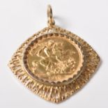 1906 SOVEREIGN COIN SET WITHIN A PIERCED PENDANT
