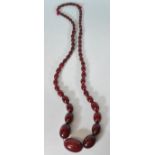 An early 20th Century cherry bakelite necklace con