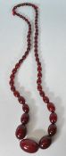 An early 20th Century cherry bakelite necklace con