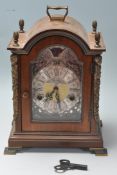 A WUBA WARMINK WESTMINSTER CHIMING MANTEL CLOCK