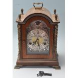 A WUBA WARMINK WESTMINSTER CHIMING MANTEL CLOCK