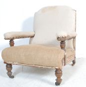 EARLY 20TH CENTURY OAK FRAME FIRESIDE ARMCHAIR / EASY CHAIR