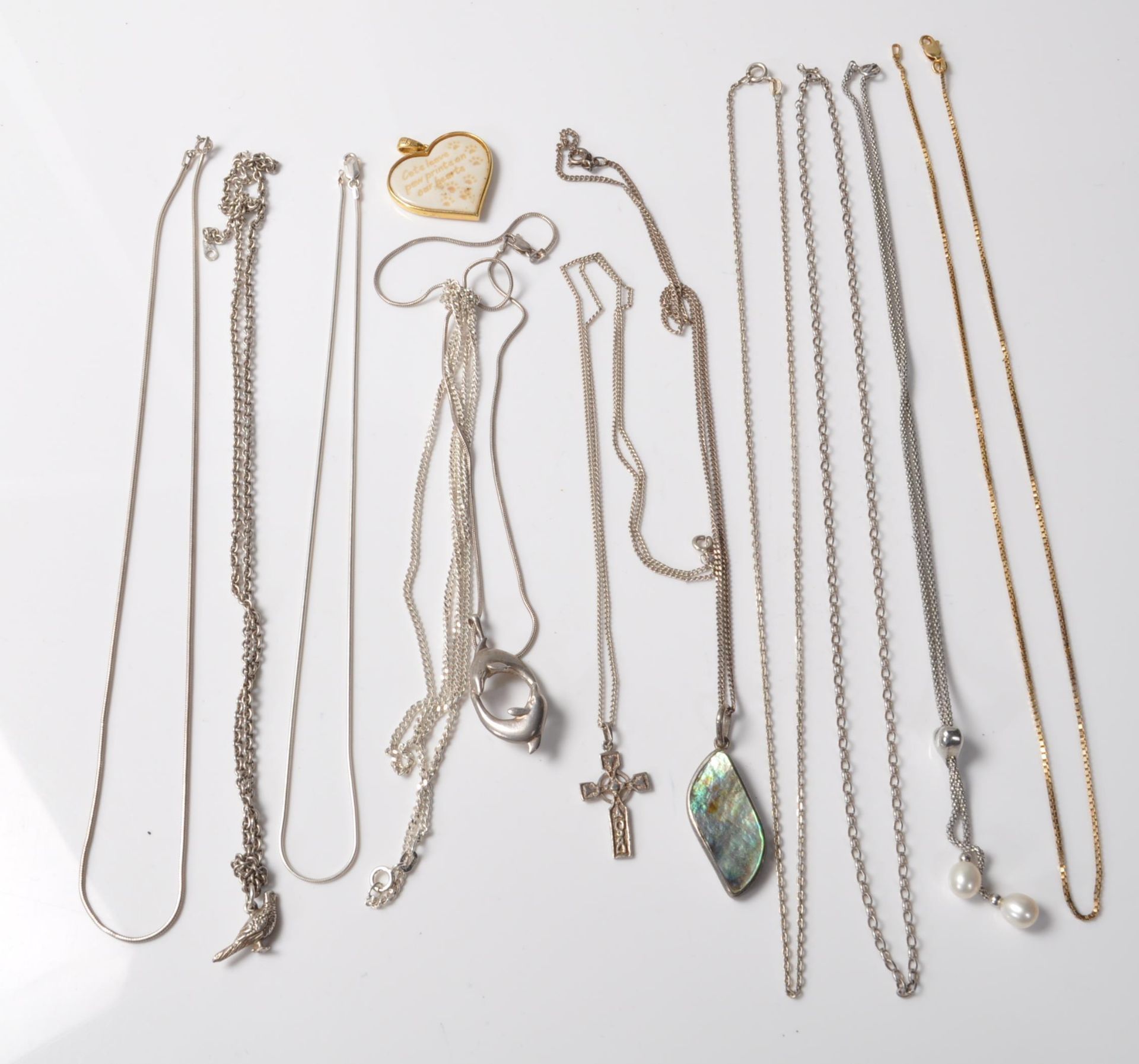 COLLECTION OF STAMPED 925 SILVER NECKLACES AND PENDANTS.