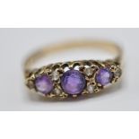 1920'S 9CT GOLD PURPLE AND WHITE STONE RING