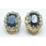 A pair of 14ct gold clip on, blue stone and diamon