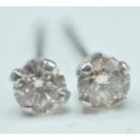 PAIR OF 14CT WHITE GOLD AND DIAMOND STUD EARRINGS