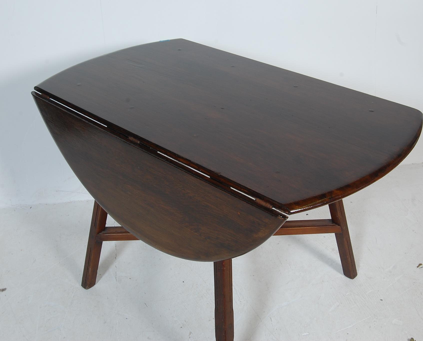 ERCOL - DROP LEAF DINING TABLE WITH FIVE WHEELBACK - Image 8 of 8