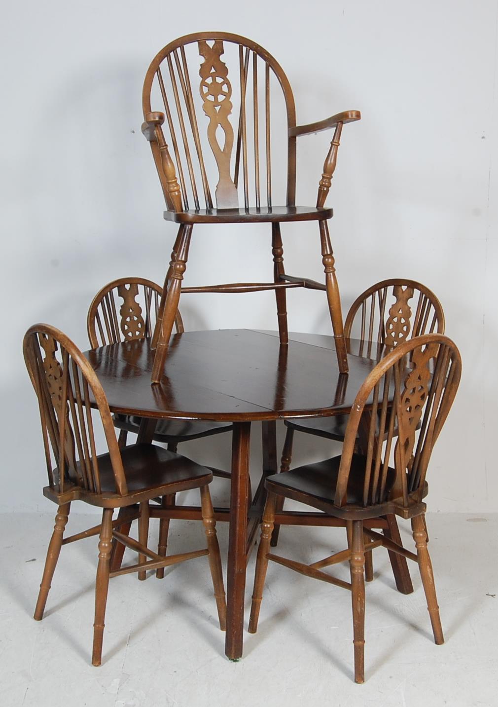 ERCOL - DROP LEAF DINING TABLE WITH FIVE WHEELBACK