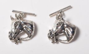 PAIR OF STAMPED STERLING SILVER CUFFLINKS IN THE F