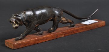 JAGUAR - 20TH CENTURY CARVED HORN JAGUAR STATUE