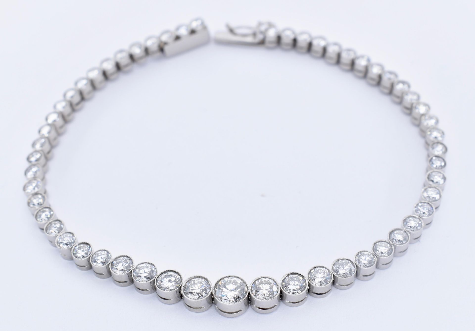 PLATINUM & DIAMOND TENNIS BRACELET