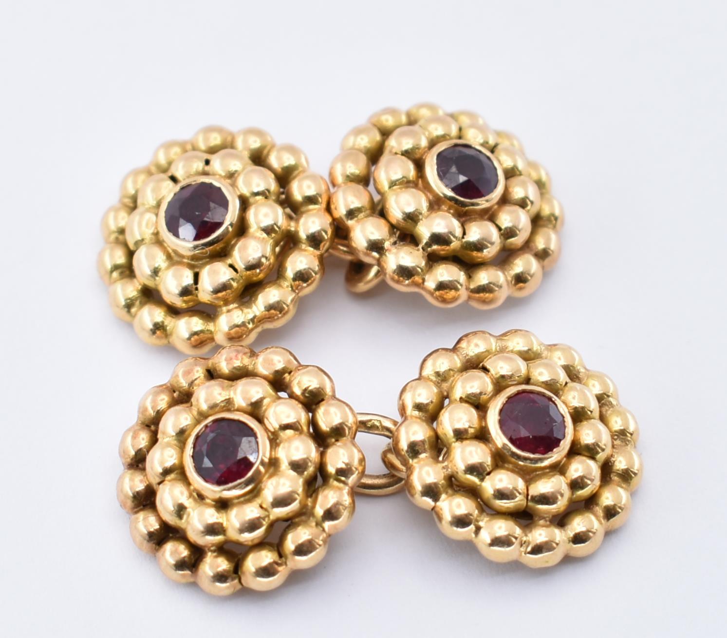 PAIR OF 18CT GOLD AND RUBY MELLERIO CUFFLINKS