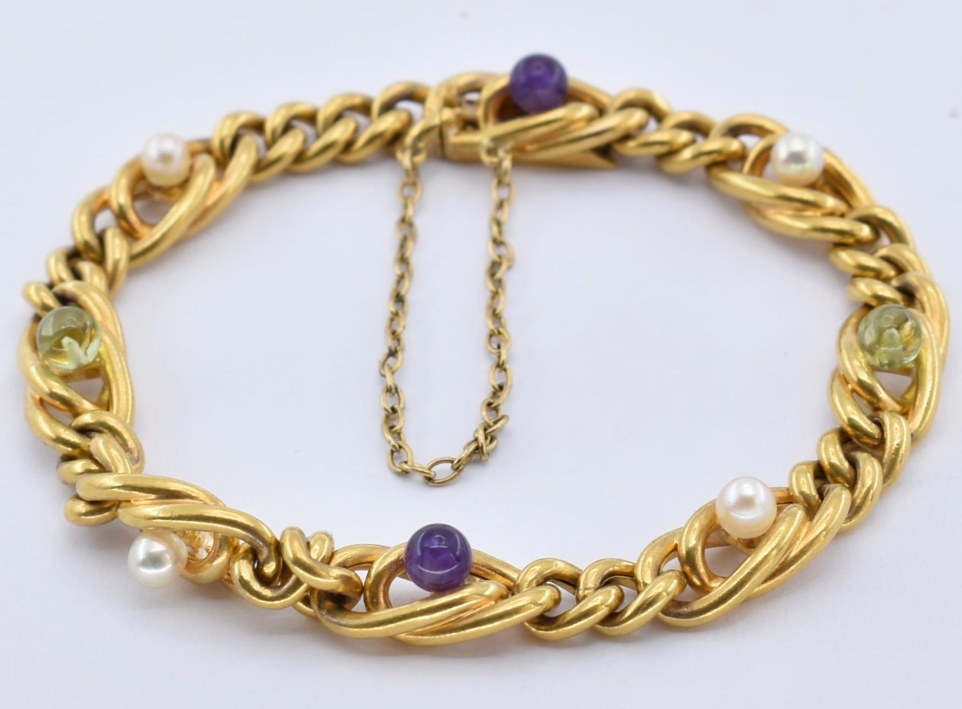 18CT GOLD PERIDOT PEARL AND AMETHYST BRACELET