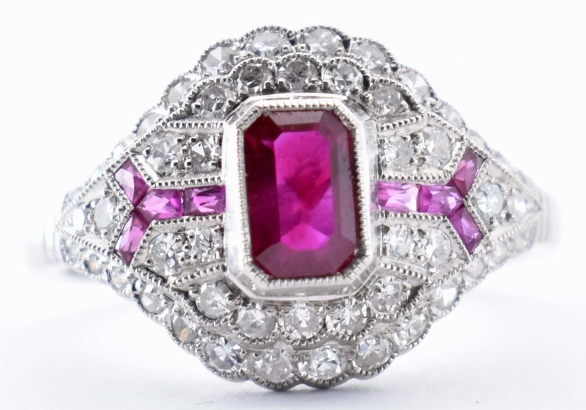 18CT WHITE GOLD RUBY AND DIAMOND CLUSTER RING