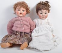 TWO ANTIQUE GERMAN MADE BISQUE HEADED DOLLS