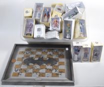 ASSORTMENT OF DC COMICS CHESS COLLECTION PIECES AND BOARD