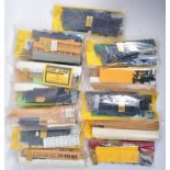 LARGE COLLECTION OF IAN KIRK 00 GUAGE PLASTIC MODEL TRAIN KITS