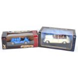 TWO BOXED 1/18 SCALE DIECAST MODEL CARS