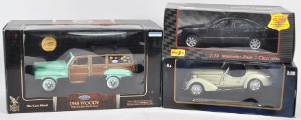 COLLECTION OF ASSORTED 1/18 SCALE BOXED DIECAST MODEL CARS