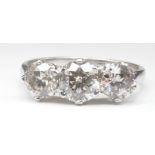 THREE STONE DIAMOND AND WHITE GOLD RING