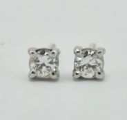 PAIR OF 18CT WHITE GOLD AND DIAMOND STUD EARRINGS