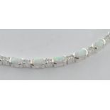 STAMPED 925 SILVER AND OPAL LADIES TENNIS BRACELET.