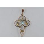 EDWARDIAN GOLD AND BLUE STONE OPEN WORK PENDANT