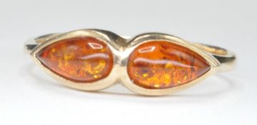 9CT GOLD AND AMBER PEAR DROP CABOCHON RING