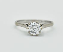 18CT WHITE GOLD AND DIAMOND SOLITAIRE RING