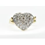 A 14CT GOLD AND DIAMOND METAMORPHIC HEART SWIVEL RING