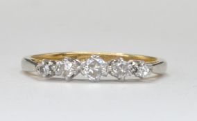 18CT GOLD AND DIAMOND FIVE STONE RING