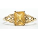 9CT GOLD AND YELLOW STONE RING