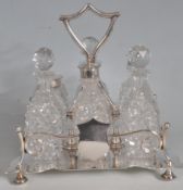 ANTIQUE SILVER PLATED AND CUT GLASS CRUET SET BY PLEASANCE AND HARPER.