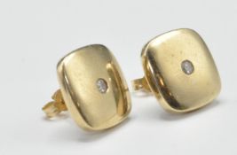 PAIR OF 9CT GOLD AND DIAMOND STUD EARRINGS