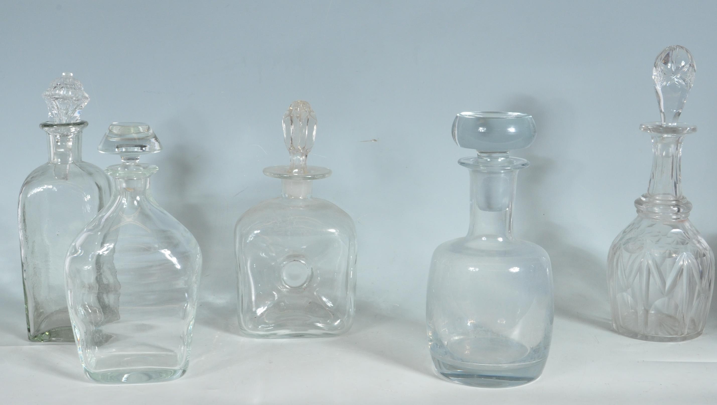 FIVE 18TH AND 19TH CENTURY GEORGIAN DECANTERS