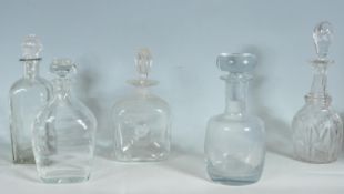 FIVE 18TH AND 19TH CENTURY GEORGIAN DECANTERS