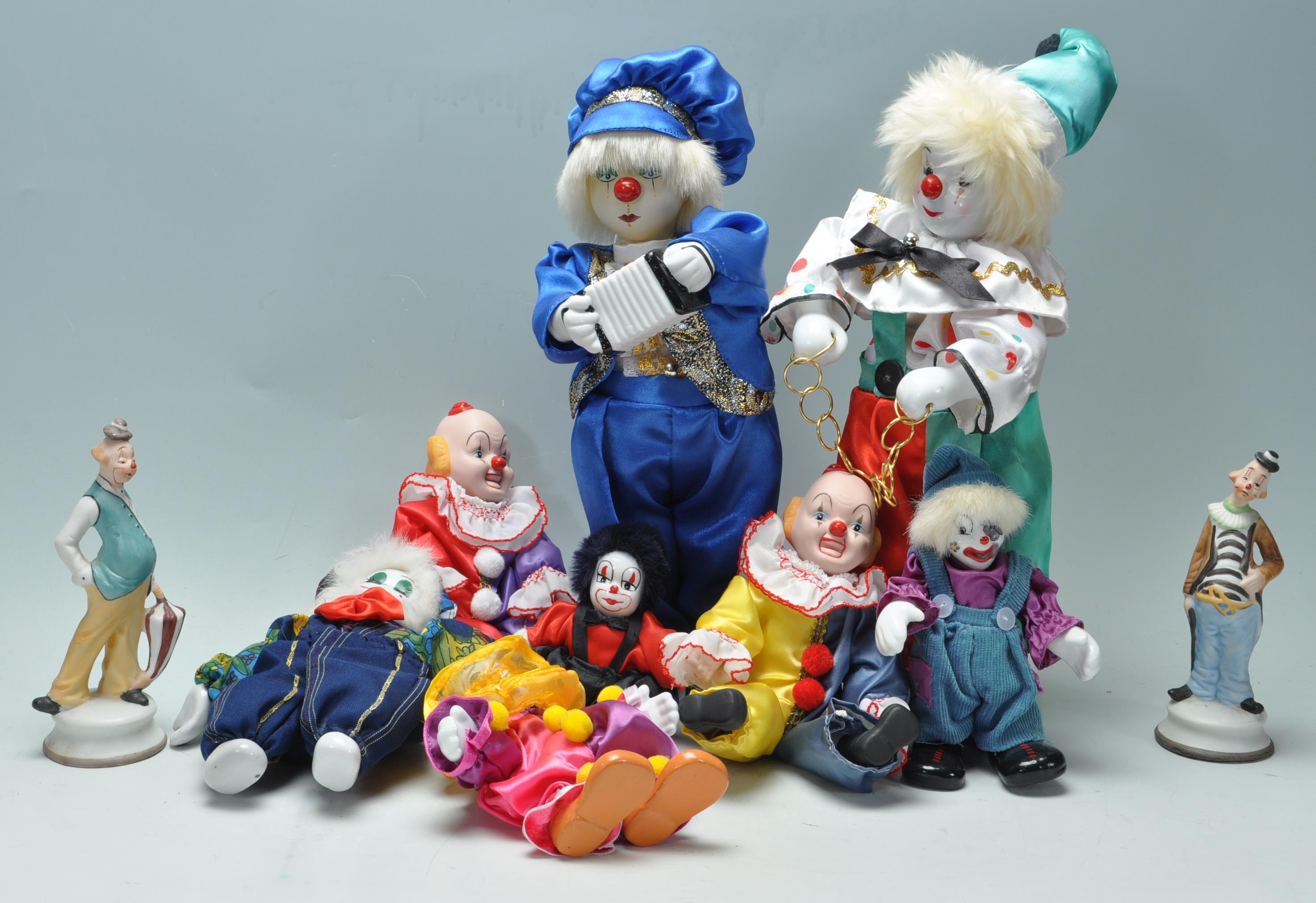 LARGE COLLECTION OF CLOWN FIGURINES WITH PORCELAIN FACES