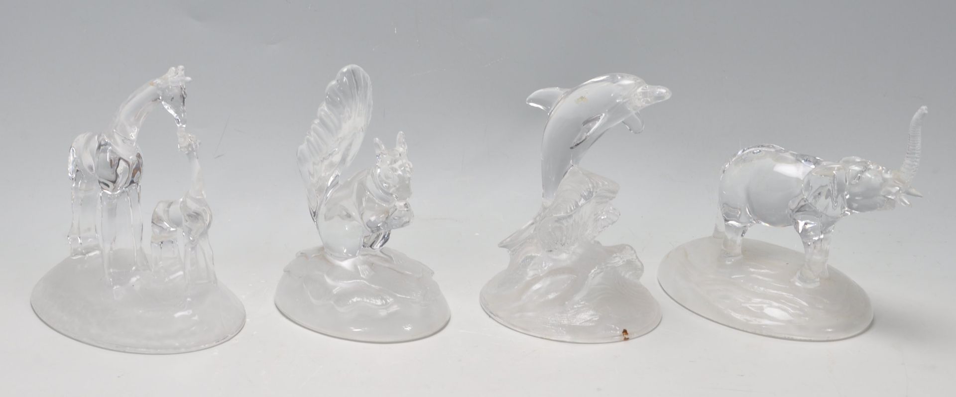 FOUR CRYSTAL FIGURINES BY D’ARQUES