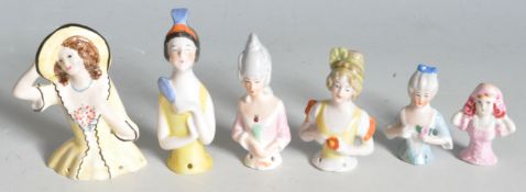 COLLECTION OF EARLY 20TH CENTURY PORCELAIN PIN CUSHION HALF DOLLS