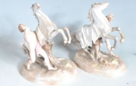 PAIR OF 20TH CENTURY MEISSEN STYLE HORSE TRAINER FIGURES.