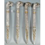 COLLECTION OF FOUR VINTAGE 20TH CENTURY TRIBAL STAFFS