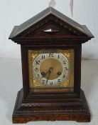 EDWARDIAN OAK MANTEL CLOCK OF ARCHITECTURAL FORM